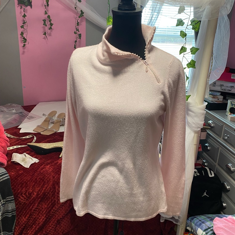 Woman’s size L pink sweater
